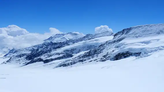 Interlaken or Grindelwald - Jungfraujoch - Top of Europe round-trip train ticket, Bern, Switzerland|Optional cable car ride up and down|All-inclusive multi-segment train tickets