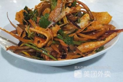 Stewed river fish in an iron pan