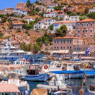  Hydra, one of the most cosmopolitan Greek islands, is located in the heart of the Argo Saronic Gulf. One of the main reasons why Hydra is a popular destination is its proximity to Athens, as a ferry from Athens to Hydra, will get you to the beautiful island in just 2 hours. It’s the perfect option for a quick getaway!
Having been a filming location of “A girl in black” and “Boy on a dolphin” movies, as well as a holiday destination for Leonard Cohen, Hydra stands out for its classy beauty!
On Hydra island, you won’t see any cars! Everyone uses their foot, boats or donkeys to get around the island. The cars ban, along with the elegant stone mansions of the island, create a charming atmosphere and make the island one of the most serene destinations near Athens.The island of Hydra is a popular small island of the Saronic Gulf, just a couple of hours ferry ride from Athens. It is famous for its picturesque architecture, the vivid nightlife, and cosmopolitan character. Except for relaxing at cozy beaches, there is not much sightseeing on Hydra island. In spring and autumn, hiking is a popular thing to do as the island is crossed by many walking paths that lead to impressive spots with sea view and historical monasteries. Hydra Town is also a picturesque place to stroll around, with elegant mansions and a museum at the port.
#mynovgetaway 
#mynovgetaway