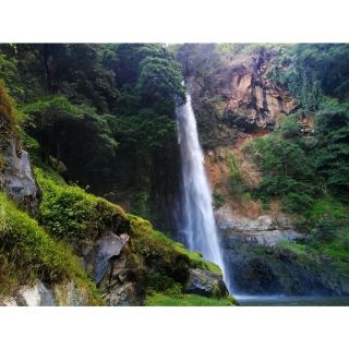 Ogi Waterfall is located in Faobata Village, Bajawa District, Ngada Regency of East Nusa Tenggara Province. You can reach this beautiful waterfall by Motorbike. Would make it more interesting and adventurous as the air’s atmosphere along the curvy road will create a stunning refreshment and also many photography places on the way there, one of them may show you the boasting Ebulobo volcano from the distance.

It is around 7 kilometers away to the east side of Bajawa city to get here. The waterfall lies quite near with the road, and you need to start to walk through the dirt path of ricef ields and concrete lines alongside the sewer. Around 900 meters walking from the first point to walk of the greenish rice field lead you toward the waterfall. During the day you would encounter some friendly local farmers with their planting activities, and it would be one of the pleasant feeling before the waterfall.

Soon as you close to the waterfall, more roaring sound of the abundant water discharge would be heard. A mass of water comes out from a slit of a line of a hill, then falls down massively in persistent speed, creating a gust over the air, blowing off water particles everywhere. In one full year, the water discharge has been massive and persistent debit of water, including in the beginning of the dry season. 
#summervacation#hikingtrails#urbanexplorer