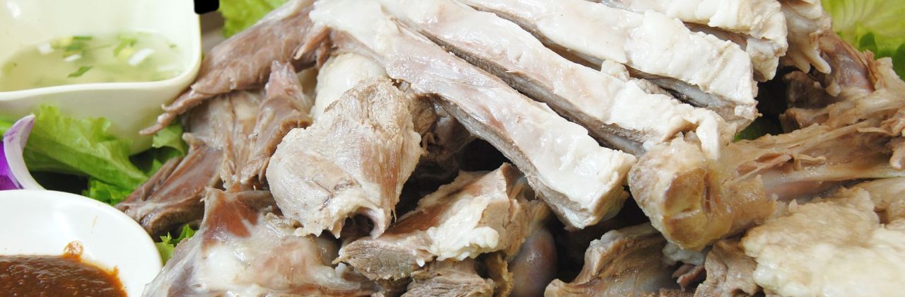 乌勒吉羊粪火自煮手扒肉饭店