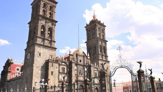 A 1-day tour to the Great Pyramid of Cholula, Puebla, and Val'Quirico.