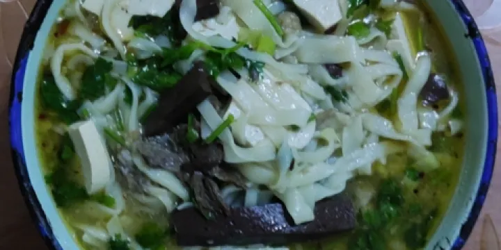 周老大一把抓羊肉