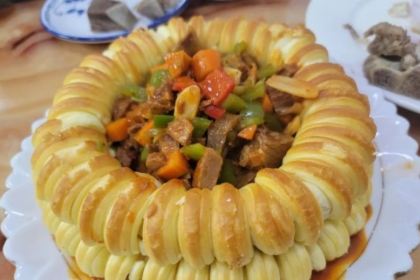 SU LAI TE SE NIU GU TAN YANG SHOU ZHUA GUAN