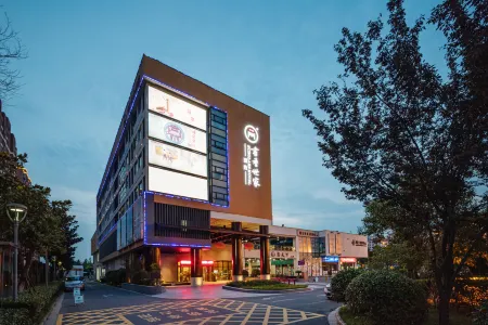 Scholars Hotel Отели в г. Суцянь