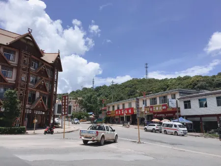 Xinyue Hotel Lushan, Ximeng Отели в г. Симэн