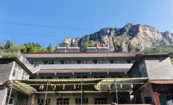 Huguan Jiujiayi Farm Inn