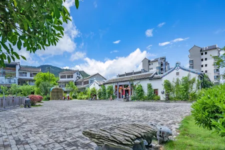 Sanshe Zongyi Hostel Отели рядом с достопримечательностью «Yearning Tea Plantation Tourist Attraction»