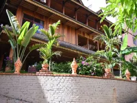 Jinghong Mankuang Daijia Chinese Inn โรงแรมใกล้สวนมันตง
