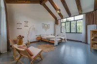 Log, Shanshe Boutique B & B -  Ferienhäuser