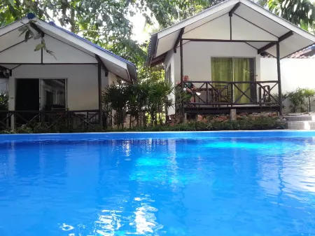 Exotic Bungalows Отели рядом с достопримечательностью «Одинокий пляж»