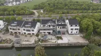 Suzhou Dao Xiang Impression Homestay (Cai Flower Sea Shop in Bei Tai Lake Tourist Vacation Area) Các khách sạn gần Xushuguan Development Zone Passenger Transport Terminal