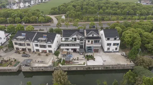 Suzhou Dao Xiang Impression Homestay (Cai Flower Sea Shop in Bei Tai Lake Tourist Vacation Area)