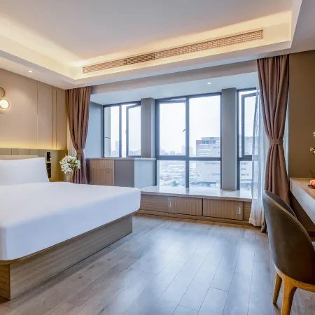 Orange Hotel (Hangzhou Jinshahu Yintai Department Store) Отели рядом с достопримечательностью «Река Фучуньцзян»