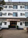 Heqing County Beiya Xingfu Hotel - pemandangan pegunungan