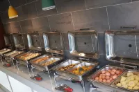 Wanbo Holiday Hotel - Morgenmad