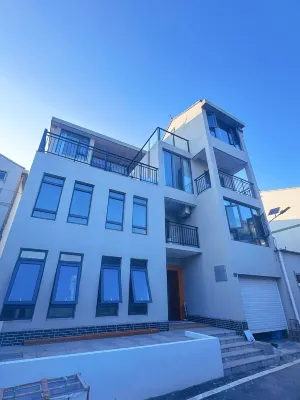 Qingfeng Xiaoyuan (Breeze Courtyard) Отели рядом с достопримечательностью «Пейзажный район Мулан Сантайшань»