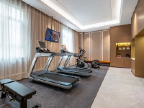 Vienna International Hotel (Guangxing Avenue East, Xinjing Plaza Store) Hoteles en Condado de Xinxing