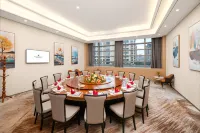Rezen Longuu Hotel (Dengzhou Municipal Government & Tuanhe National Wetland Park Branch) - موقف سيارات