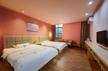 Yi Pin Holiday Hotel (Haikou Meilan Airport) Отели рядом с достопримечательностью «Qiongtai Normal University (Guilinyang Campus)»