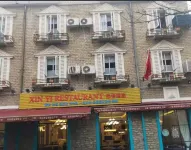 Pengzhou Xinyi Hotel