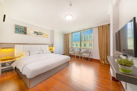 Jinhao Business Hotel (Wuchuan Aoyuan Plaza) Отели в г. Учуань