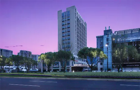 Hangzhou Fuyang Ruiqi Hotel (Fuchun New World Shop) Отели рядом с достопримечательностью «Hangzhou Polytechnic (Gaoke Road)»