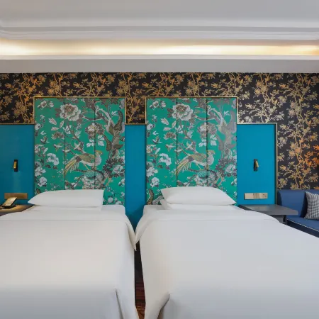 Jinjiang Metropolo Hotel (Korla Peacock River Loulan Never-Night City)