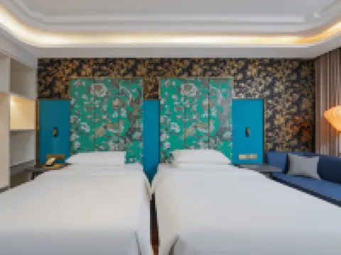 โรงแรมจินเจียง เมโทรโปโล (แม่น้ำยูงคู่เอ่อเล่อ เมืองโลวหลานไม่เคยหลับใหล)