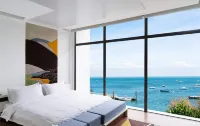 Happy Hour Seaview Apartment (Bayuquan Hongji Branch)