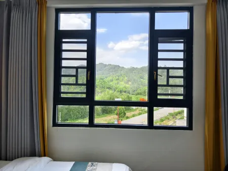 Pingbei North and South Dishan Warm Homestay Отели рядом с достопримечательностью «Beidi Mountain Tourist Area - Viewing Platform»