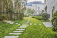 崑崙樂居精選飯店（惠濟區金達路地鐵站店） 福潤多生活購物中心附近的飯店