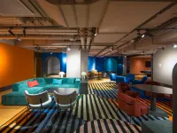 baseLITE HUANGXING Serviced Apartment Отели рядом с достопримечательностью «Янпу»