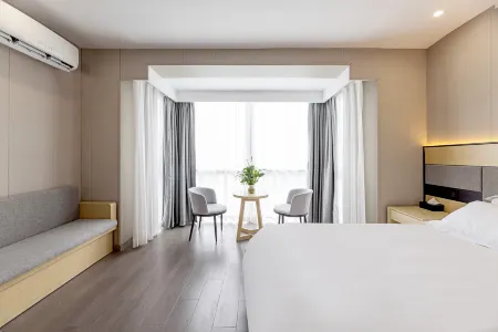 Yizhou Hotel Отели рядом с достопримечательностью «Minhang Gymnasium»