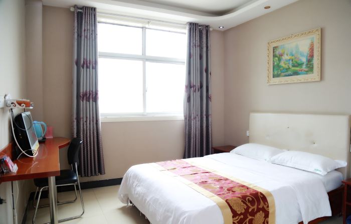 Xun County Zhaojie Business Hotel