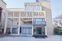 Xintun Holiday Hotel（Shanghai Jiuting Subay Station Branch） โรงแรมในซินซวง, ซิเปา