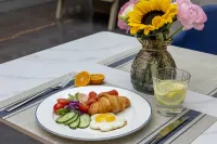 Kyriad Marvelous Hotel Hami Gongyuandaguan Community Manjie Life Plaza - breakfast