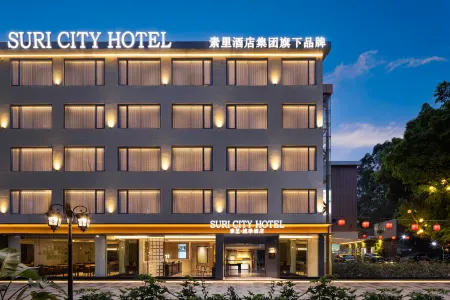 SURI CITY HOTEL Отели рядом с достопримечательностью «Guangdong University of Foreign Studies (South Campus)»