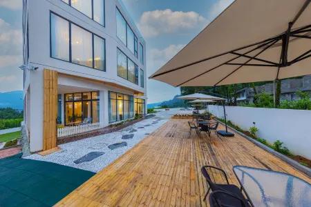 Siji Shanju Guesthouse Отели рядом с достопримечательностью «Yulong Crevice»