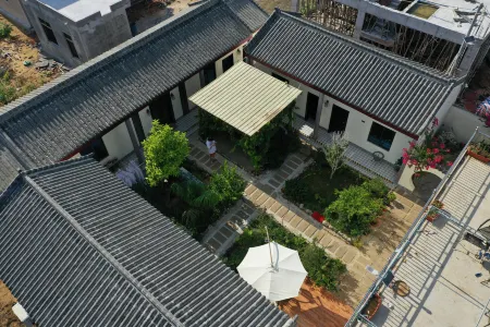 Xuwen Sihe Tingyuan Homestay (Shanhuguan Tourism Area) Отели рядом с достопримечательностью «Denglou Cape»