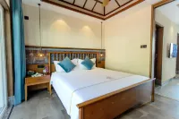 Jizhu Holiday Apartment (Menghai Mengbala Store)