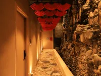Secret Garden Hotel Hotels near District 12