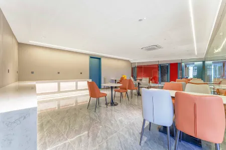 Yisu Impression Hotel (Xinchang Hongxing Meikailong) Отели рядом с достопримечательностью «xinchangzhongguocxin chang zhong guo cha shihashi»