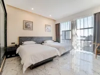Yawan Impression Business Hotel (Songyuan Jinjiang Street store) Hotel dekat Jiangxindao Tourist Zone