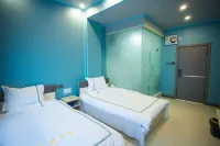 Olunchunqi Nuomin Xinyi Hotel