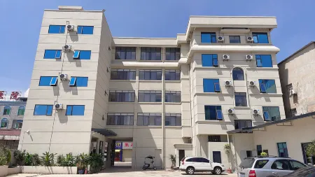 Xinxianghe Hotel Отели рядом с достопримечательностью «Honghe Vocational and Technical College»