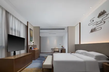 Elong Hotel (Lu'an Shuangchuang Building) Отели в г. Луан