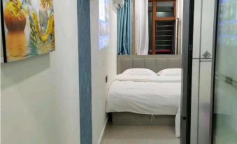 Yanji Songzi Apartment (Yanbian University Network Red Wall Shop)