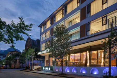 Xiangyue Shanshui Homestay (East Gate Store of Libo Xiaoqikong Scenic Area) Отели в г. Либо