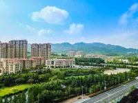Rongyuan Windsor Mulsanne Hotel (Qingdao Academician Port Expo Branch) Hotel in zona Xijiushui